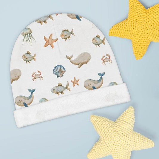 The Ocean Breeze Baby Beanie, a perfect blend of warmth, comfort, and adorable style for your little one during the cooler months. Crafted from 100% polyester, this 