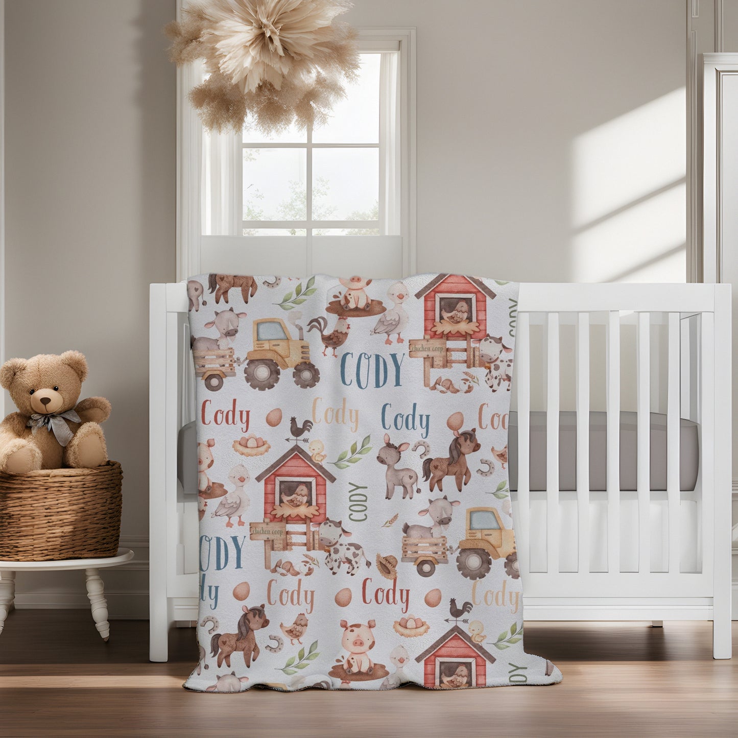 Farm-themed baby blanket customizable with a child's name, featuring cute farm animals, perfect for adding a personalized touch to baby's room.