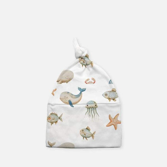 Dress your little treasure in the Ocean Breeze Baby Knotted Hat, where adorable meets comfort in the softest embrace. This hat boasts a vintage-inspired knotted deta